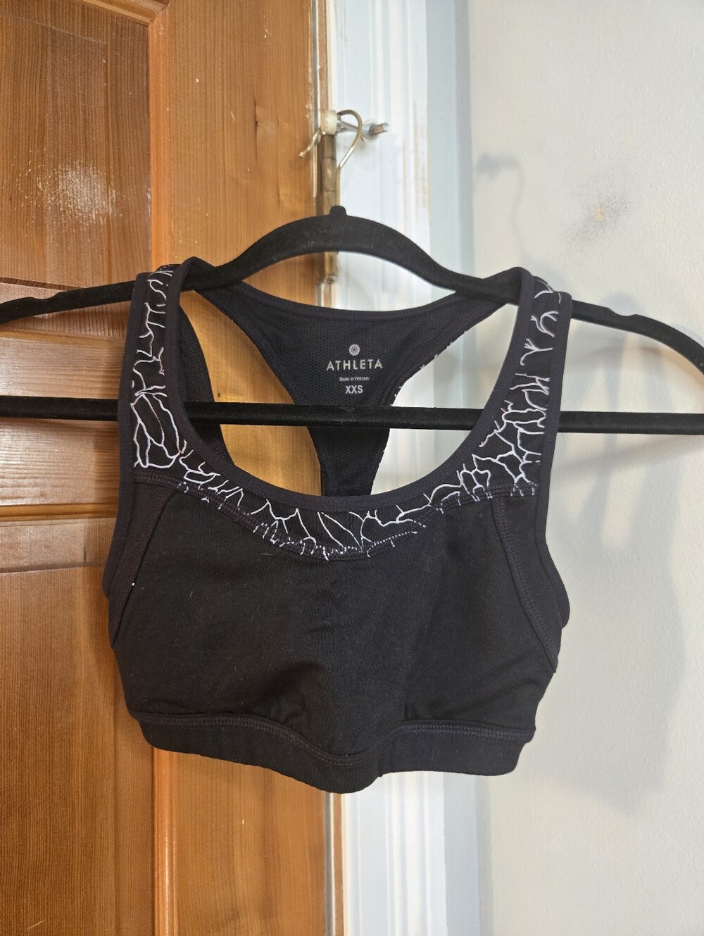 Athleta Black Racerback Sports Bra with White Contrast Detail